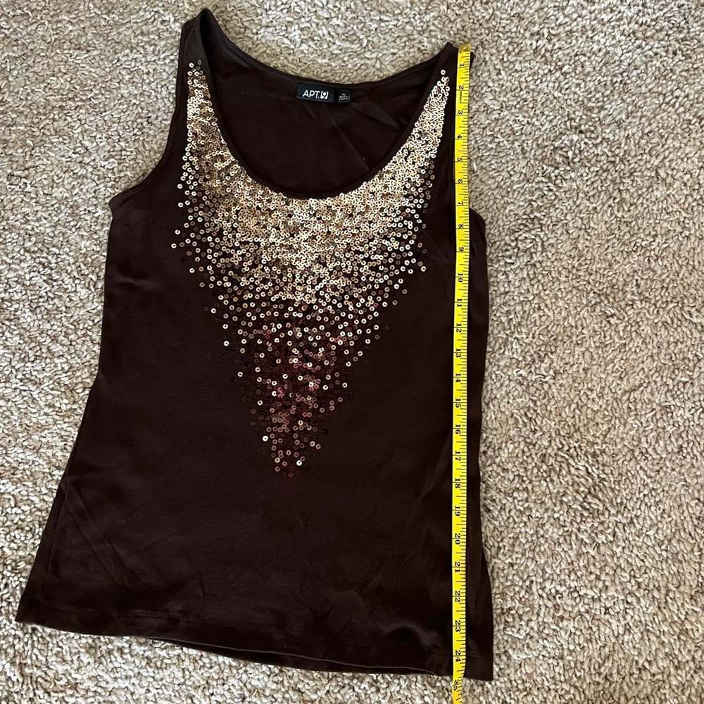 Dress up for day or night with this sequence tank top!